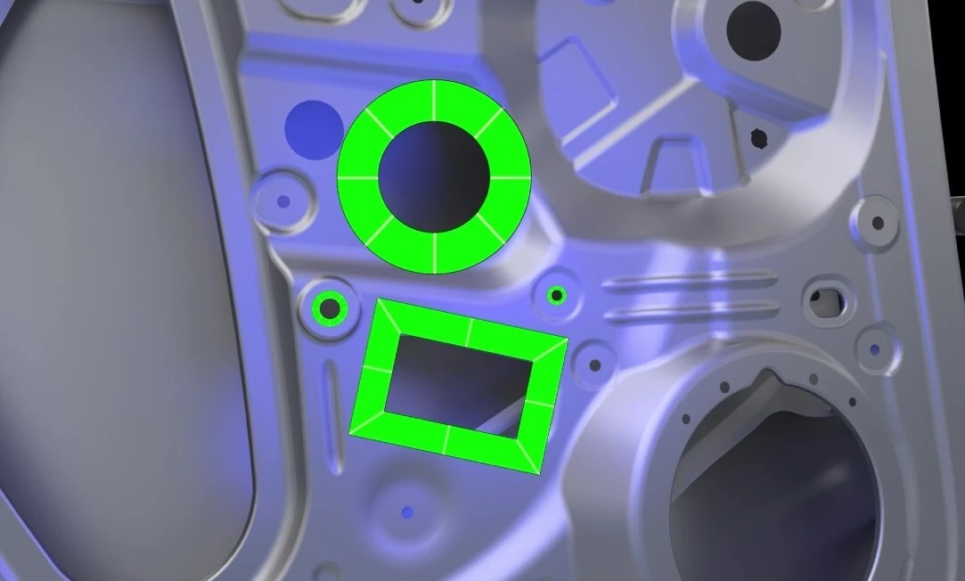 3D prikaz limenog dijela sa zeleno označenim rubovima kružnih i pravokutnog otvora.