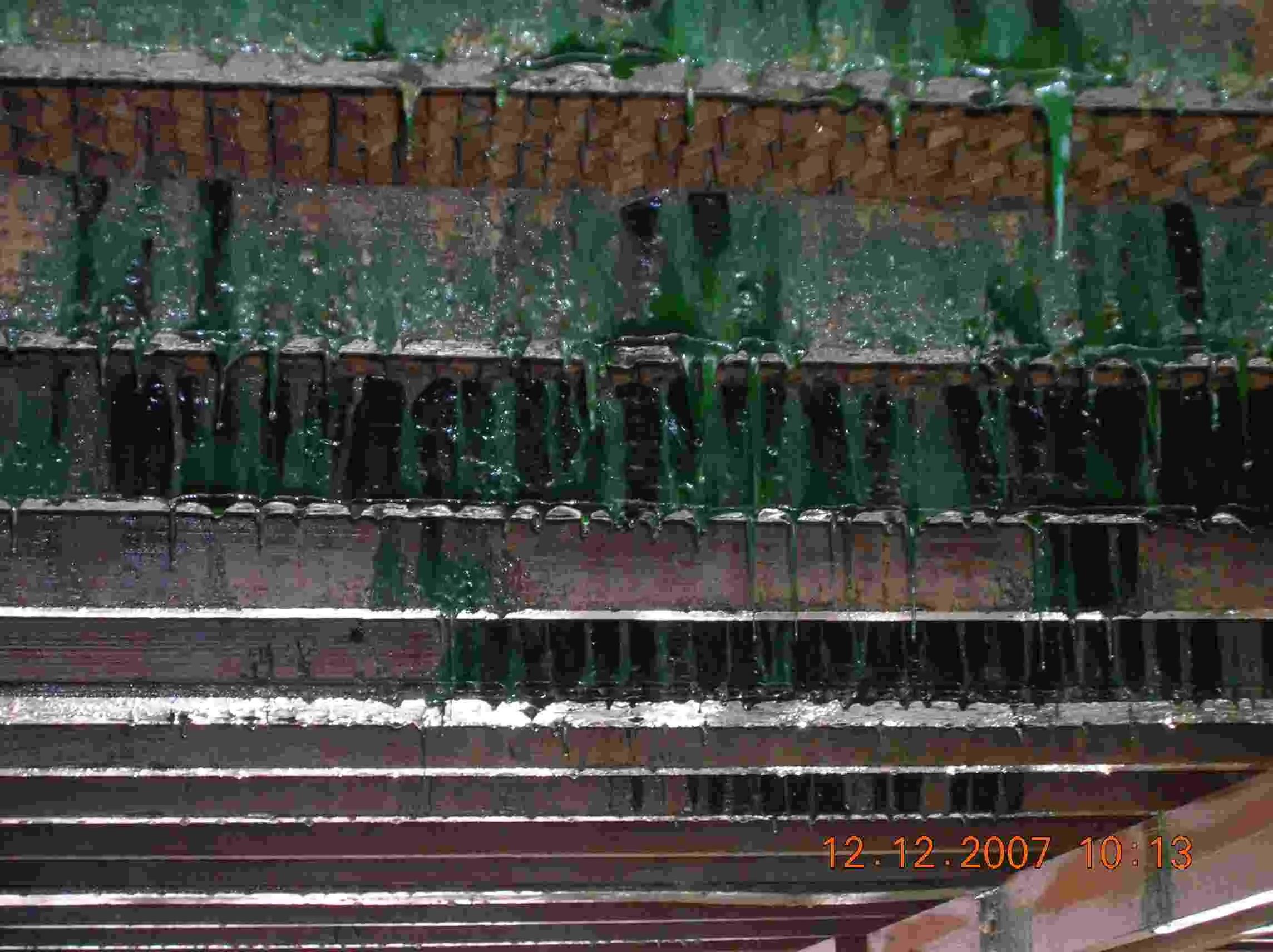 Algae growth at the cooling tower before installation.