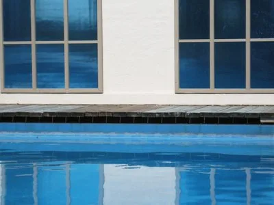 Swimming pool water treatment
