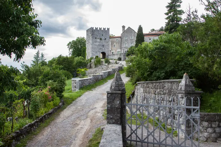 Castle gate and stone path in Štanjel